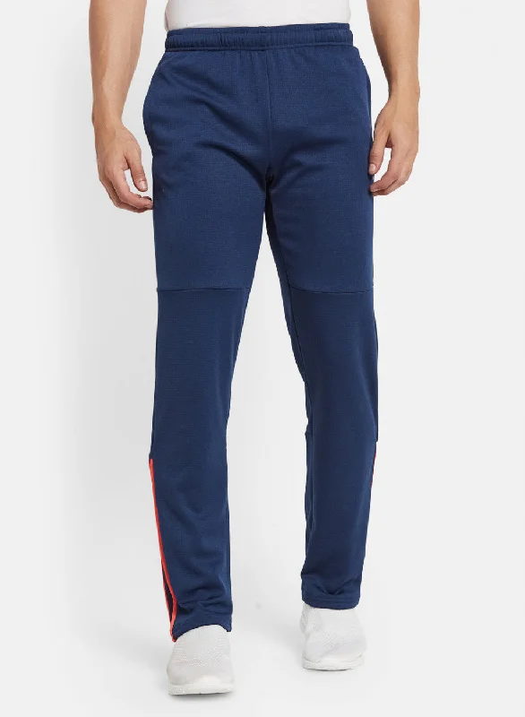 Shop the look you love at prices you’ll love even more! Men NAvy Blue Solid Trackpant Shop the look you love at prices you’ll love even more! Men NAvy Blue Solid Trackpant