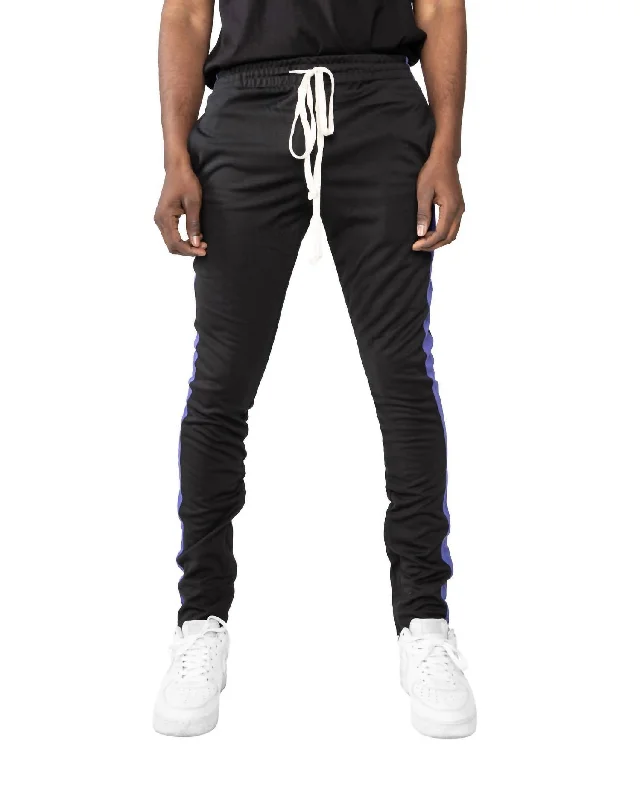 Shop affordable clothing for every season – Big savings this weekend only! Men's Track Pant In Black/purple Shop affordable clothing for every season – Big savings this weekend only! Men's Track Pant In Black/purple